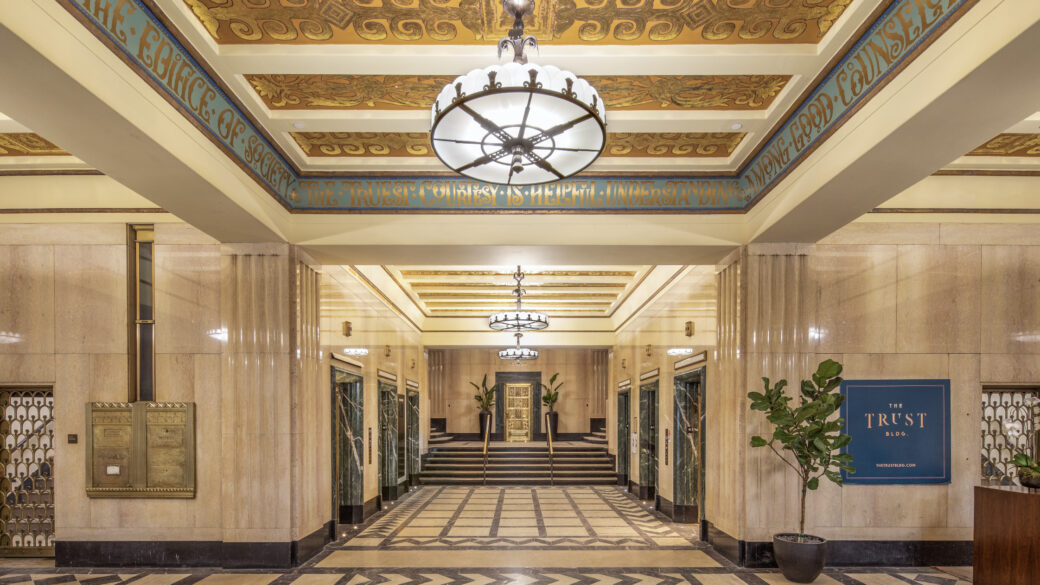 Interior view of the lobby in The Trust Building, looking at the elevator hallway.