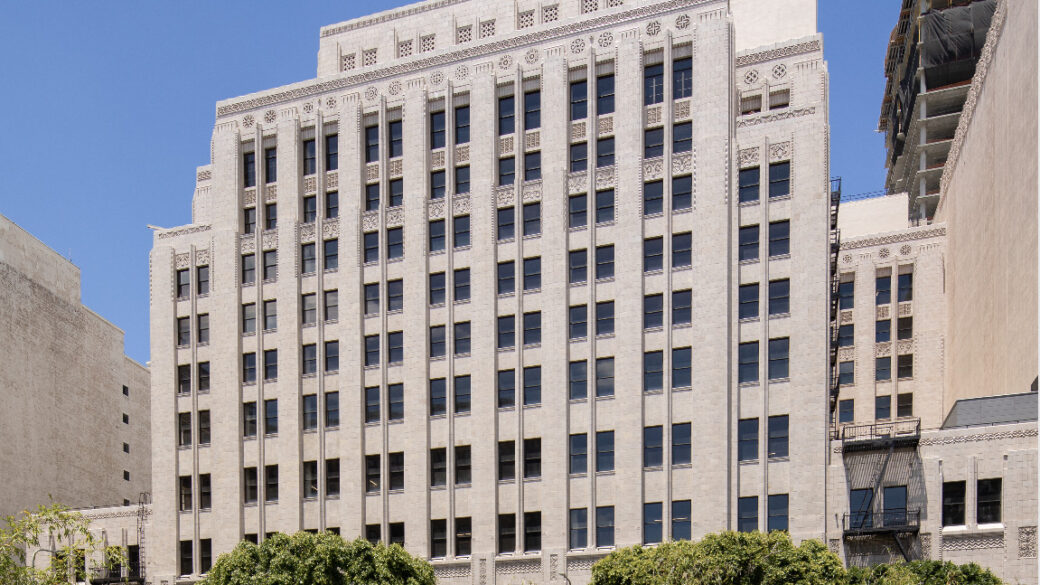 Exterior view of The Trust Building from the park across the street.