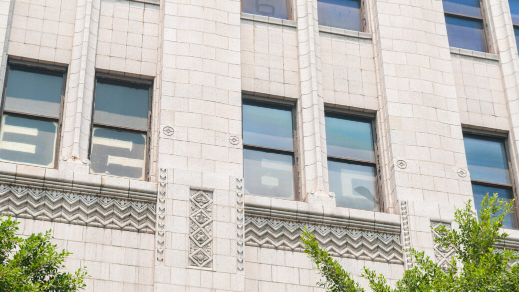 Exterior image of the Trust Building masonry and windows.